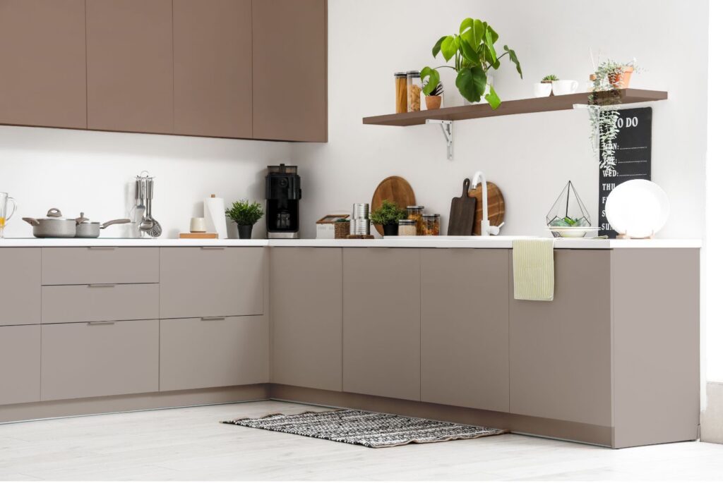 Kitchen with cabinets in fall paint colours for 2025.